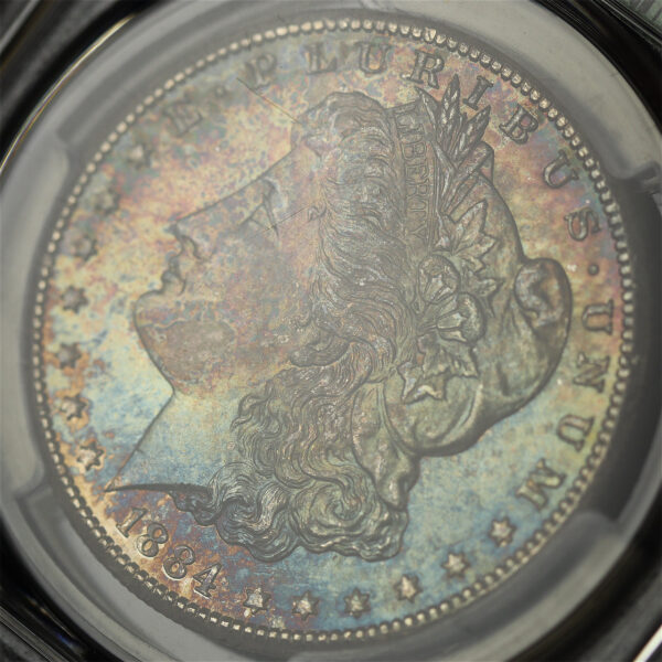 Gallery image of this 1884-CC Morgan Dollar PCGS MS-66 CAC PCGS 30th Anniversary Old Green Holder, Smoky Blue & Violet Toning