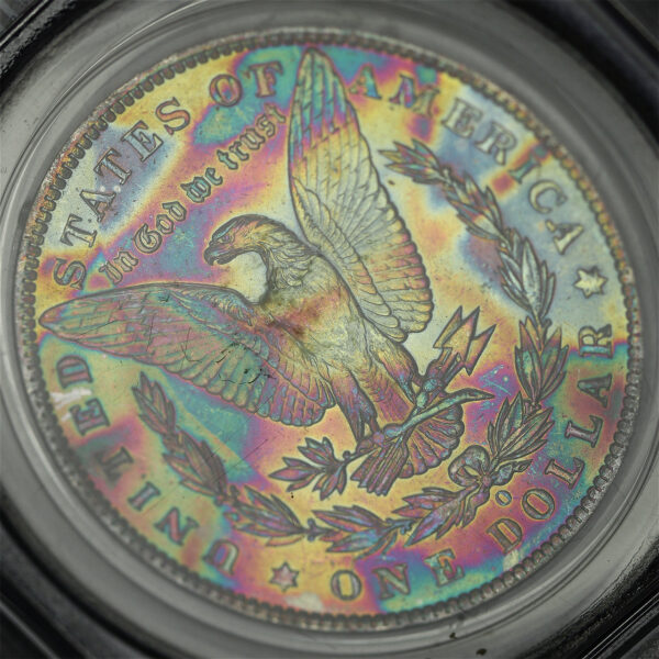 Gallery image of this 1885-O Morgan Dollar PCGS MS-64 Vibrant End Of Roll Rainbow Reverse Toning 