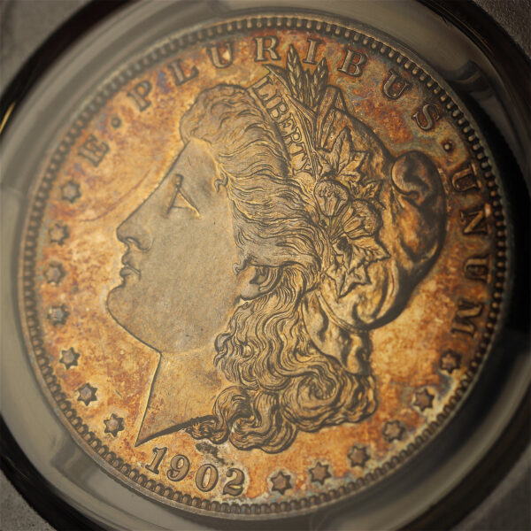 Gallery image of this 1902 Morgan Dollar PCGS PR-62 Fiery Sunset Hue Toning