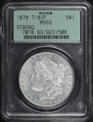 Obverse of this 1878 7/8TF Strong Morgan Dollar Old Green Gasket Holder PCGS MS-63