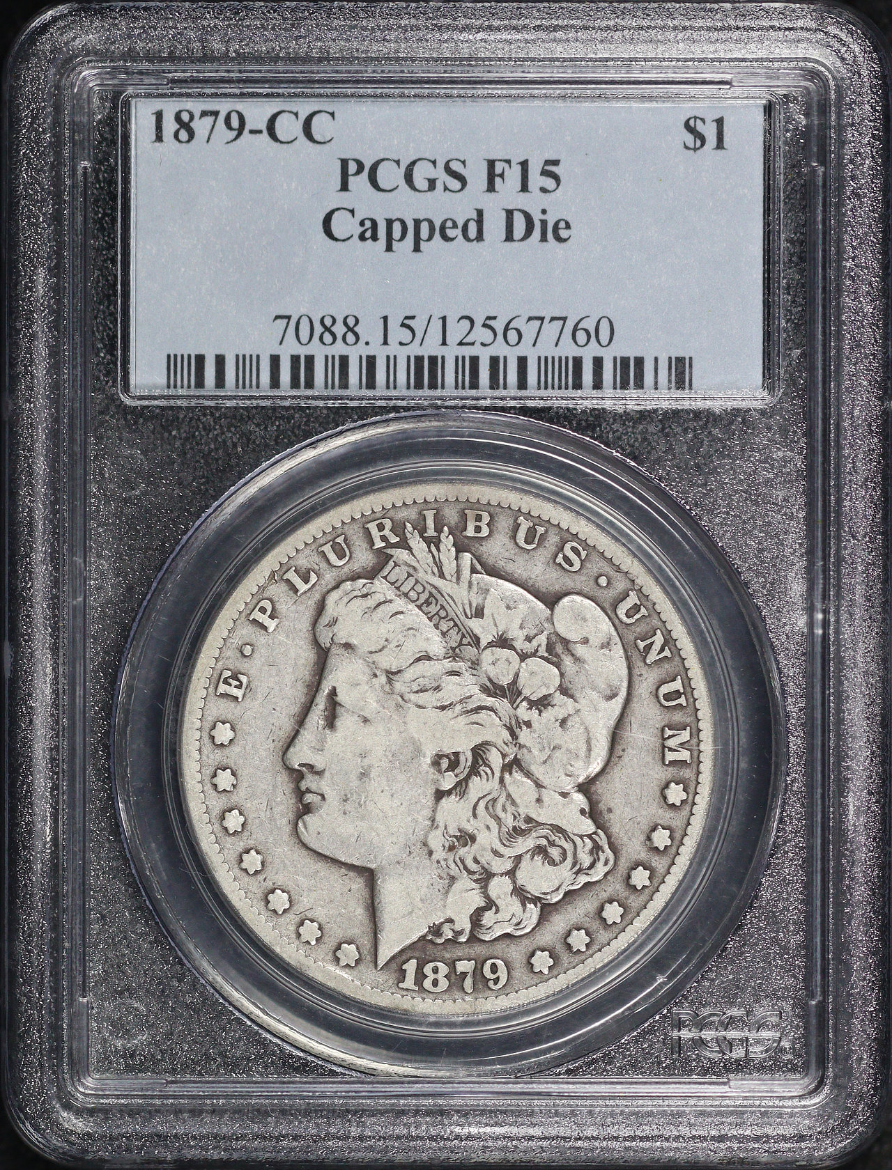 Obverse of this 1879-CC Morgan Dollar Capped Die PCGS F-15