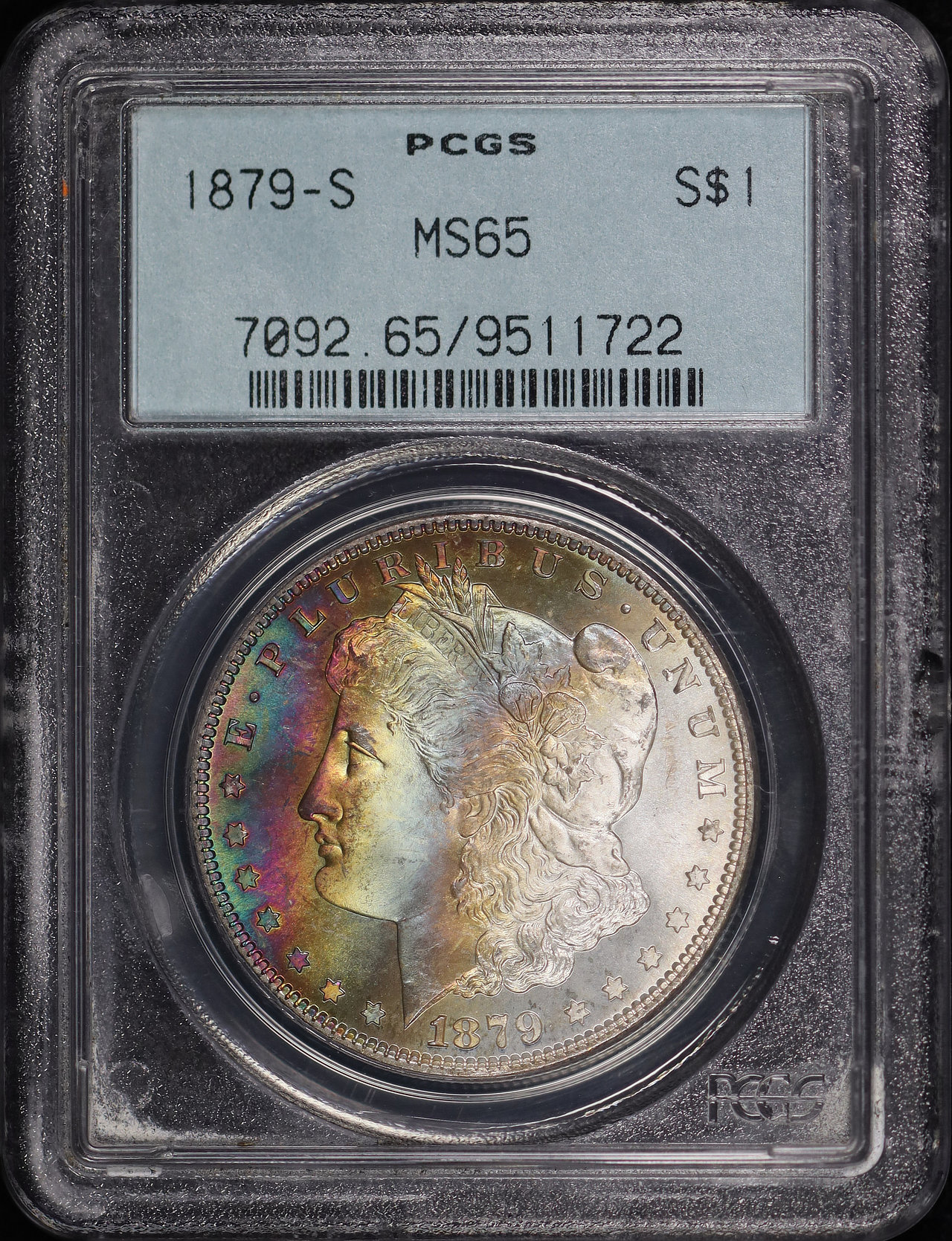 Obverse of this 1879-S Morgan Dollar PCGS MS-65 Old Green Holder Banded Rainbow Obverse Toning
