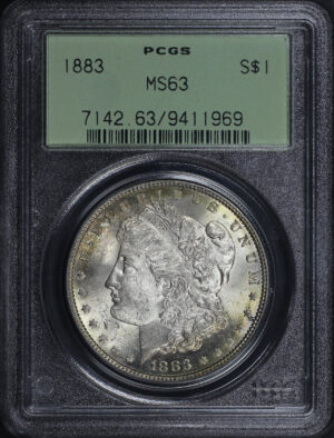 Obverse of this 1883 Morgan Dollar PCGS MS-63 Old Green Holder Rainbow Reverse Toning