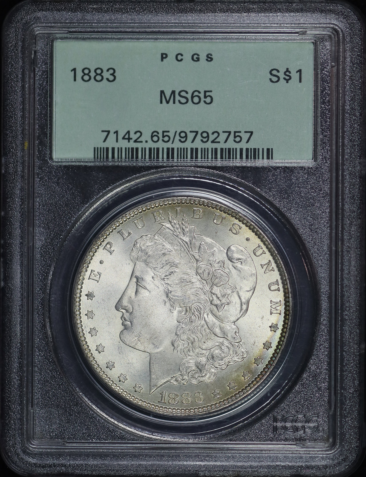 Reverse of this 1883 Morgan Dollar PCGS MS-65 Old Green Holder Reverse Rainbow Toning.