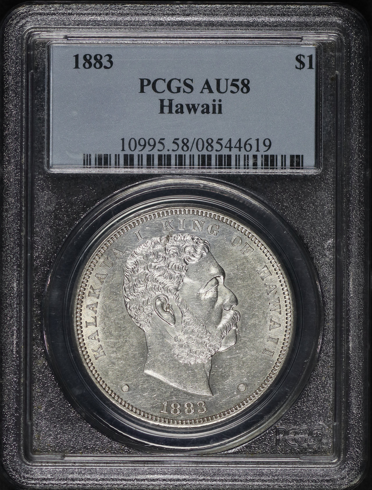 Obverse of this 1883 Hawaii Dollar PCGS AU-58