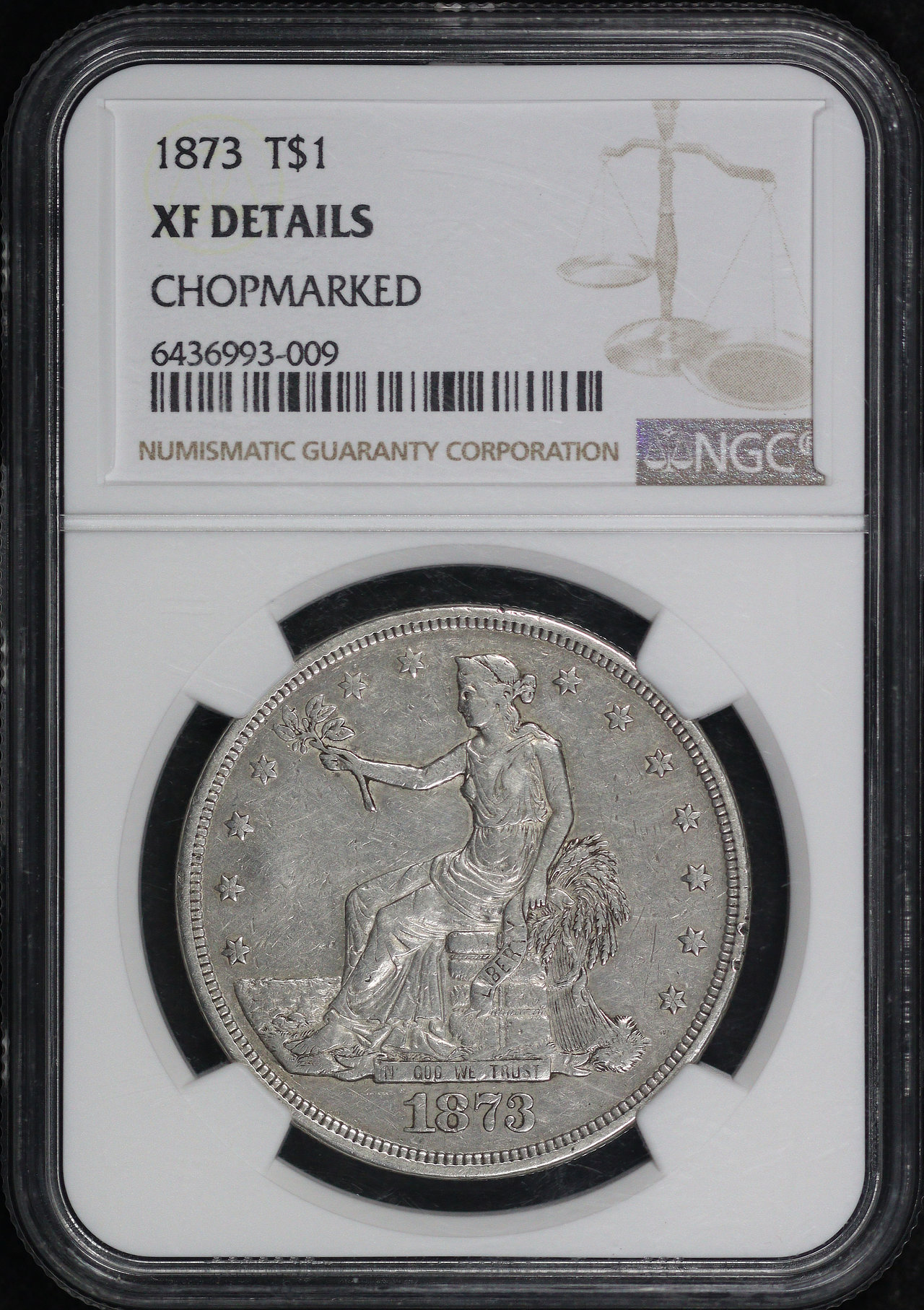 Obverse of this 1873 Trade Dollar NGC XF Details Chopmarked