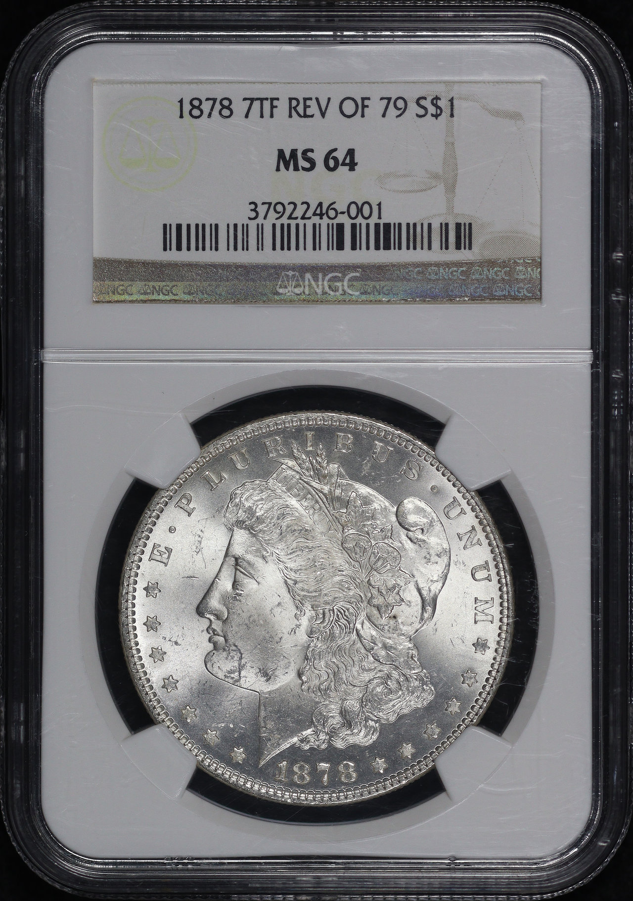 Obverse of this 1878 7TF Reverse of 1879 Morgan Dollar NGC MS-64