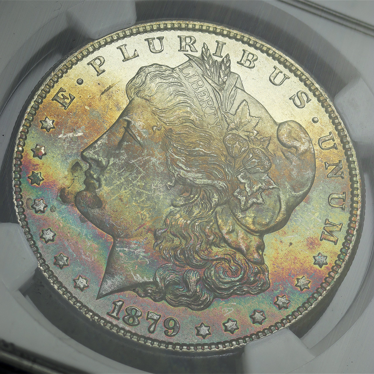 Gallery image of this 1879-S Morgan Dollar NGC MS-65★ Banded Rainbow Obverse Toning