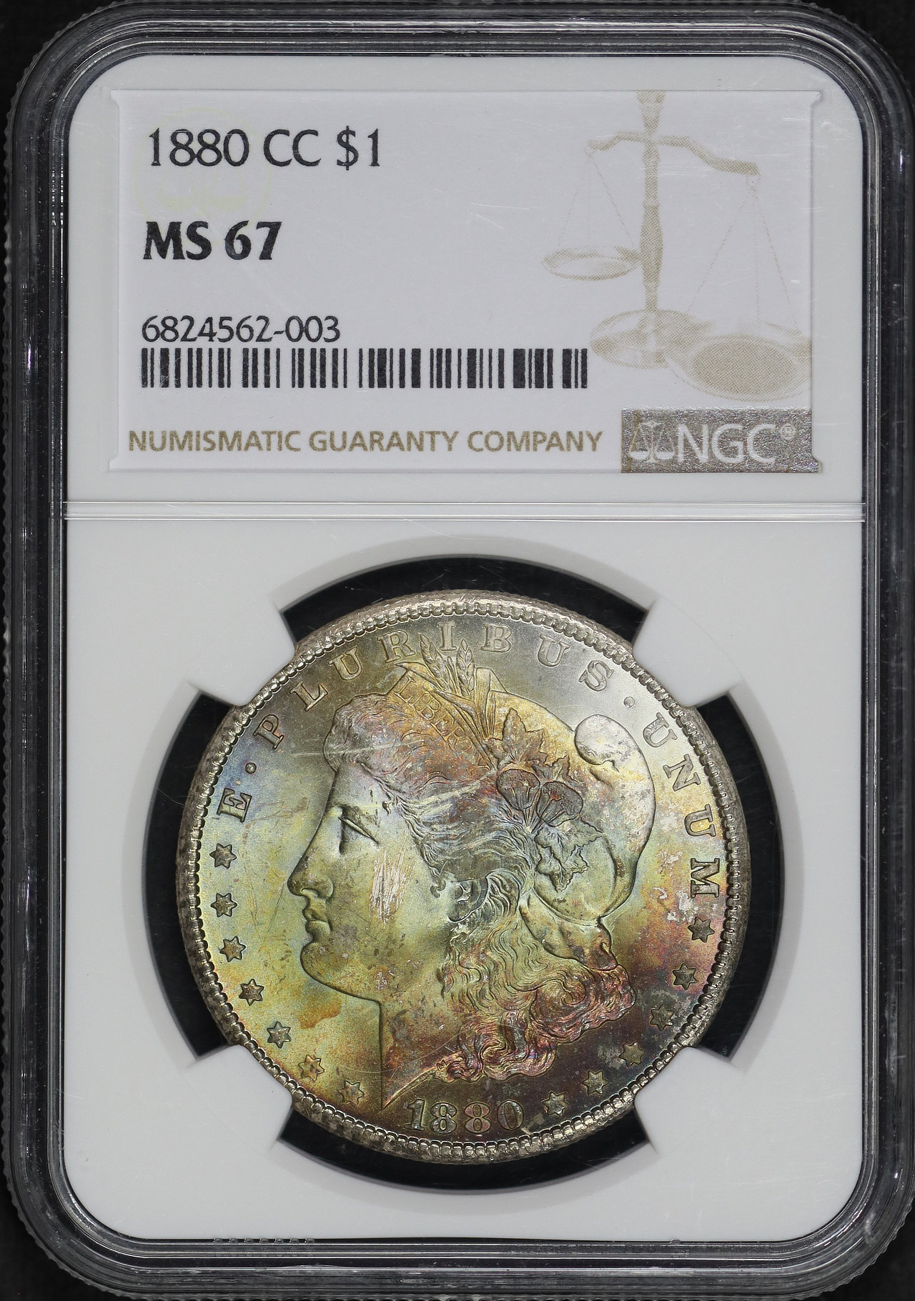 Obverse of this 1880-CC Morgan Dollar NGC MS-67 Rainbow Obverse Crescent Toning