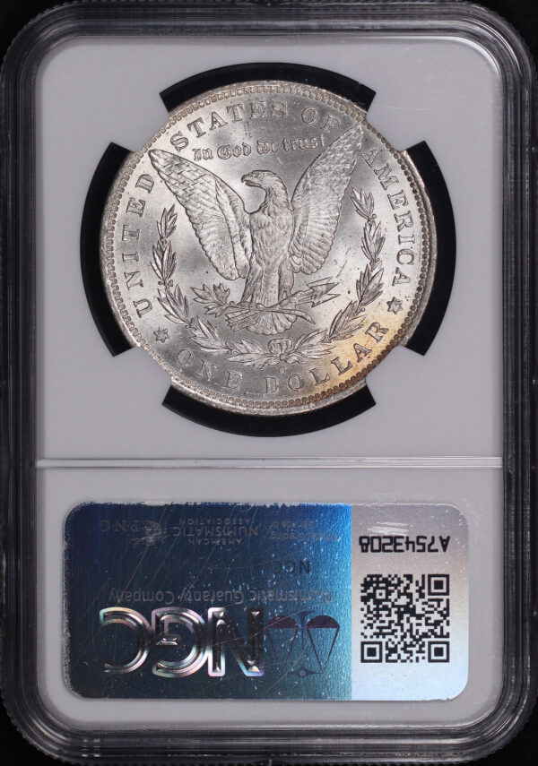 Reverse of this 1884-O Morgan Dollar NGC MS-66+ CAC – Gold Obverse Toning