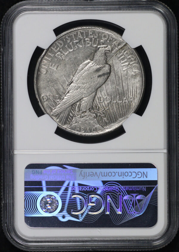 Reverse of this 1921 High Relief Peace Dollar NGC AU-55 Mint Error Cracked Planchet @ 5:00