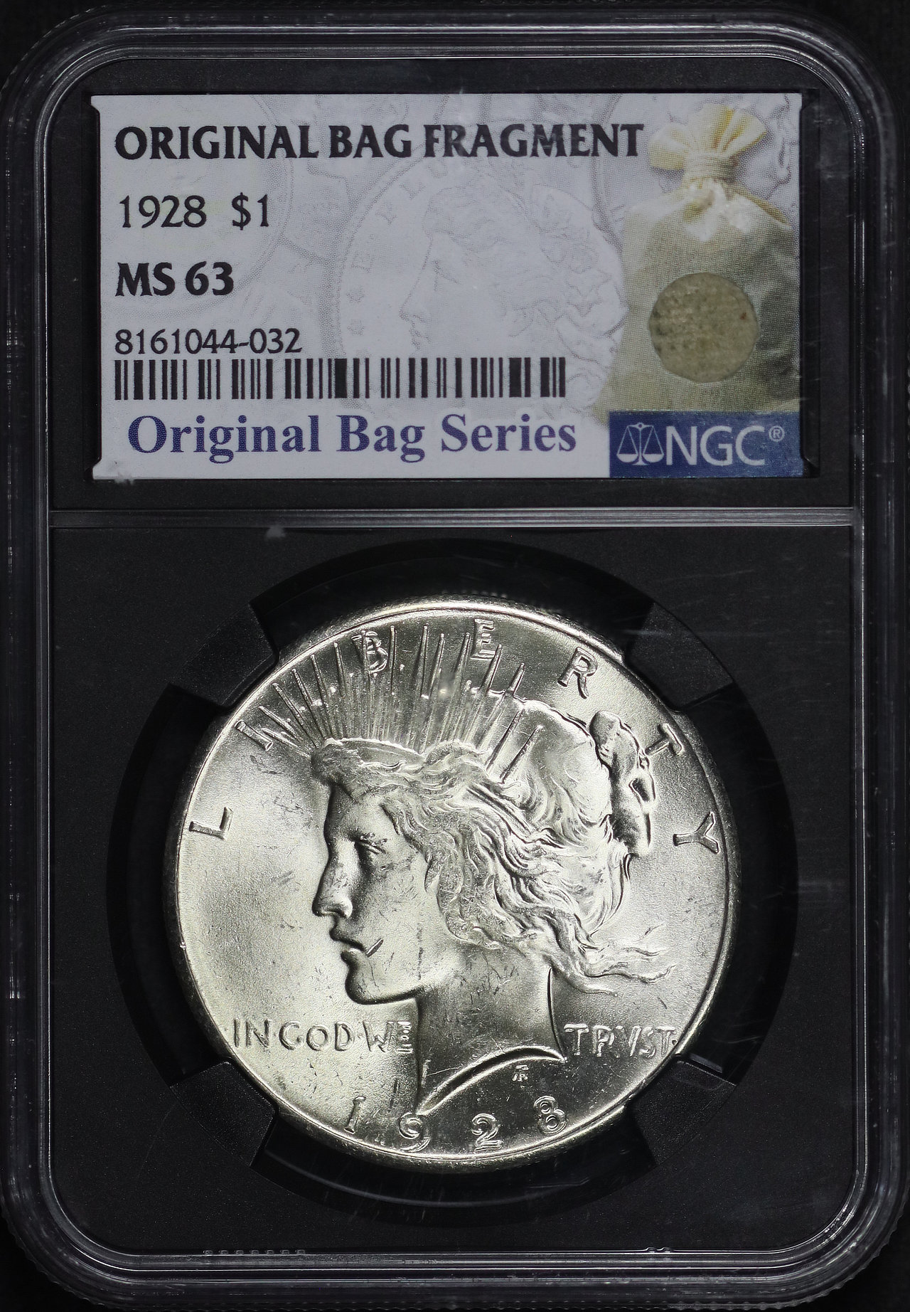 Obverse of this 1928 Peace Dollar NGC MS-63 Black Core Original Bag Fragment Label