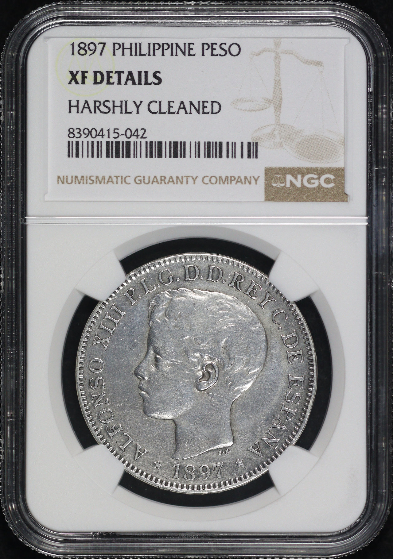 Obverse of this 1897 Philippines Alfonso XIII Silver Peso KM#154 NGC XF Details Harshly Cleaned
