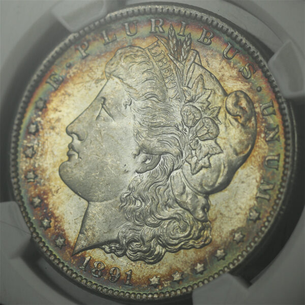 Gallery image of this 1891-CC Top-100 VAM-3 Spitting Eagle Morgan Dollar NGC MS-65 Blue, Green, & Crimson Rim Toning
