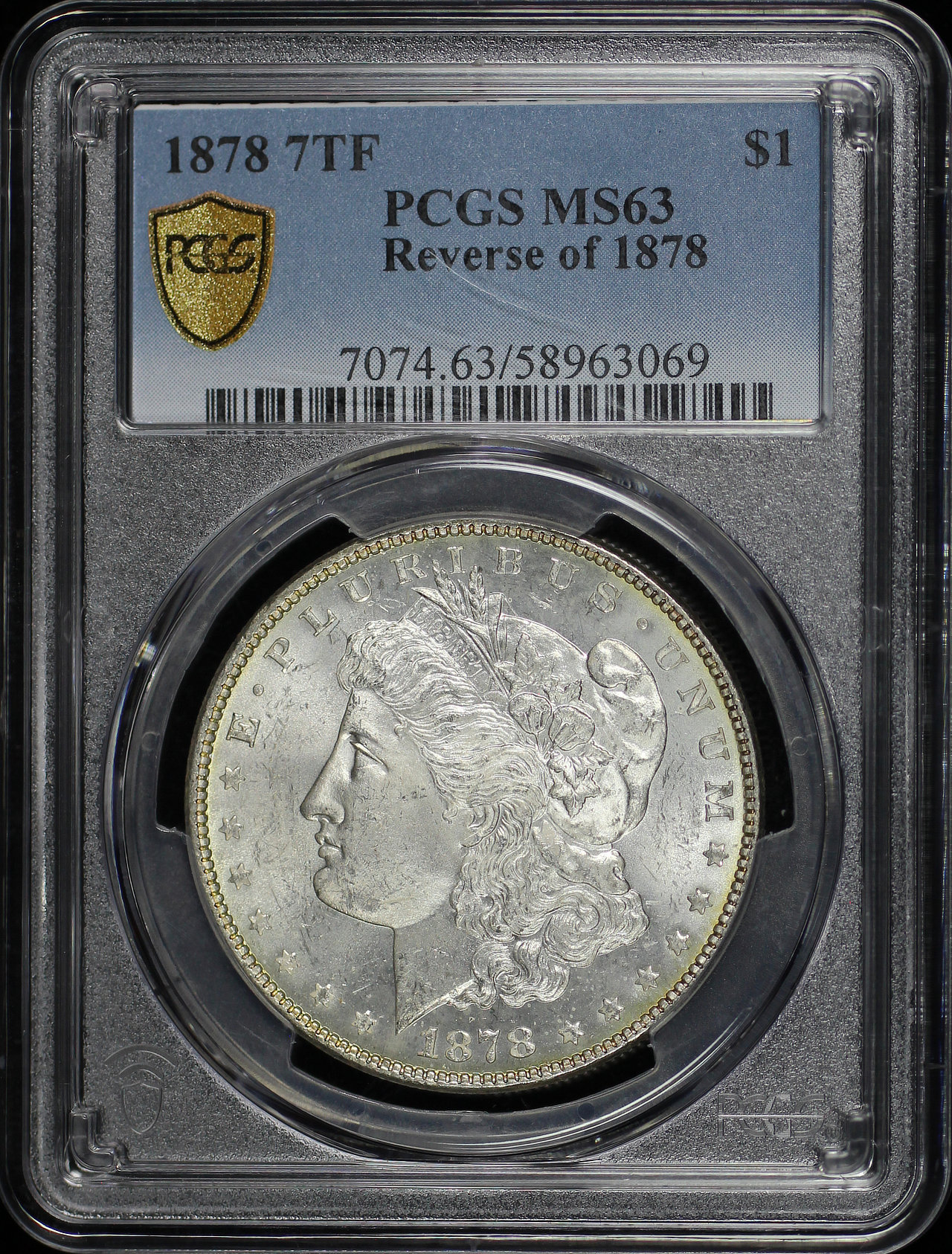 Obverse of this 1878 7TF Morgan Dollar Reverse of 1878 PCGS MS-63