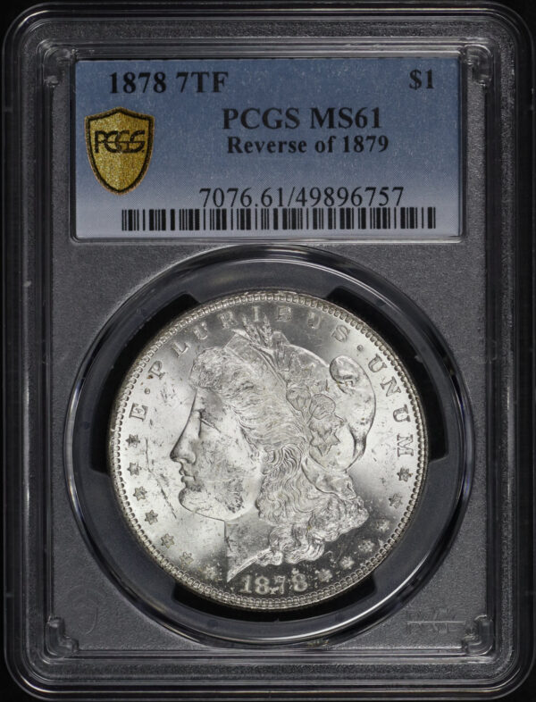 Obverse of this 1878 7TF Morgan Dollar Reverse of 1879 PCGS MS-61