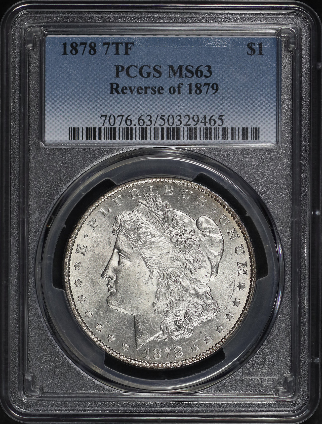 Obverse of this 1878 7TF Morgan Dollar Reverse of 1879 PCGS MS-63