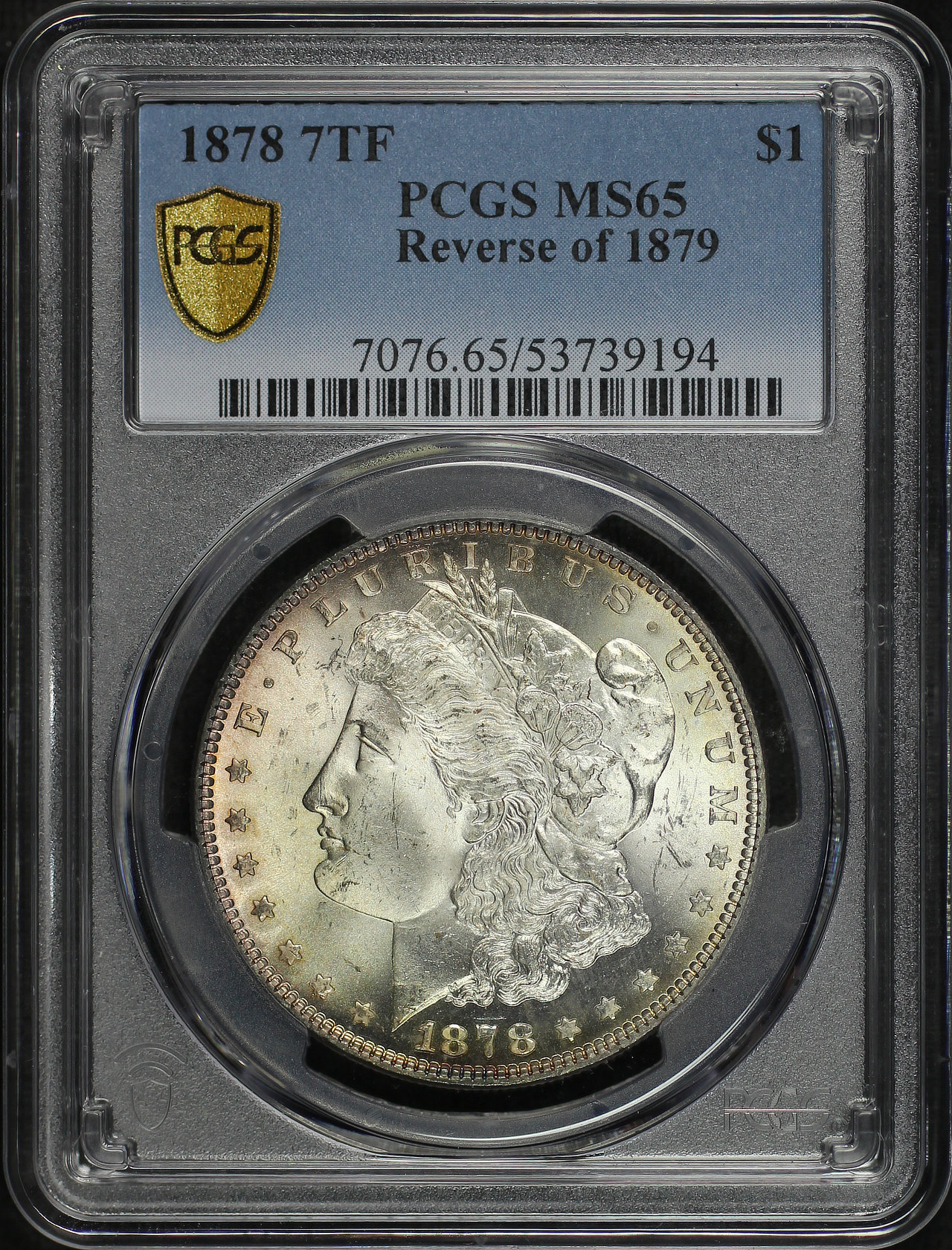 Obverse of this 1878 7TF Morgan Dollar Reverse of 1879 PCGS MS-65