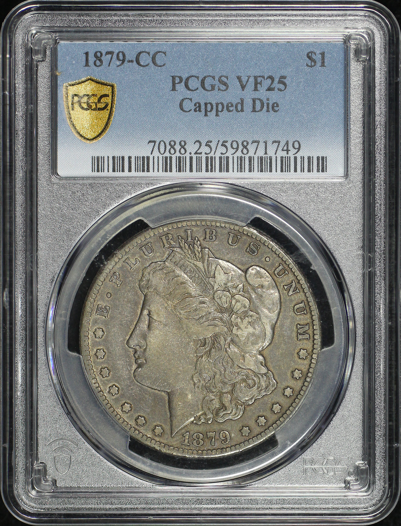Obverse of this 1879-CC Morgan Dollar Capped Die PCGS VF-25