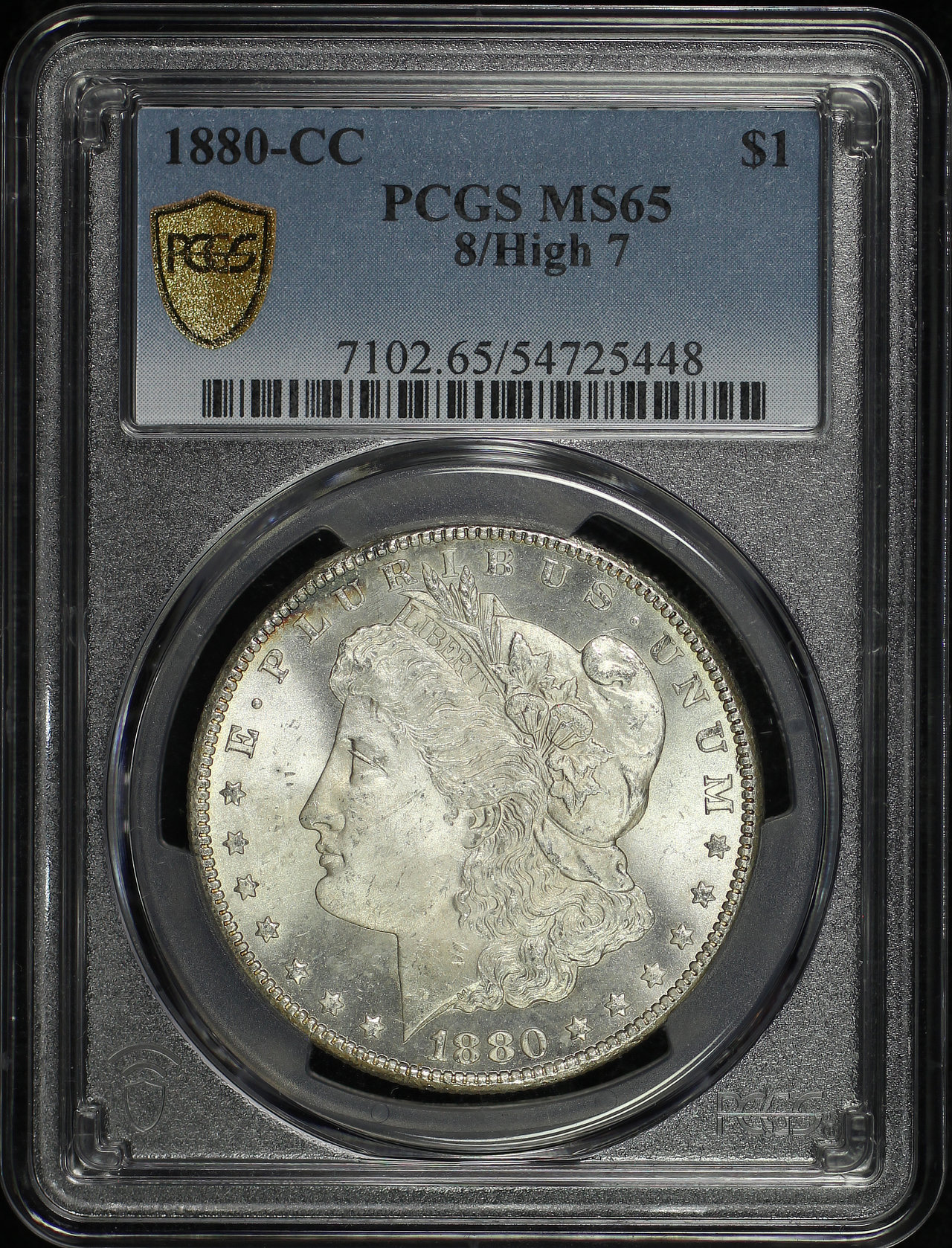 Obverse of this 1880-CC Morgan Dollar 8/High 7 PCGS MS-65
