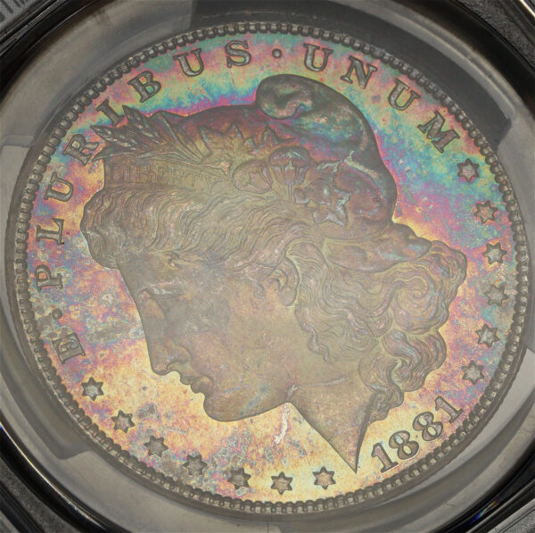 Gallery image of this 1881-CC Morgan Dollar PCGS MS-67 Vibrant Yellow, Violet, Blue, & Olive Green Hue Obverse Toning