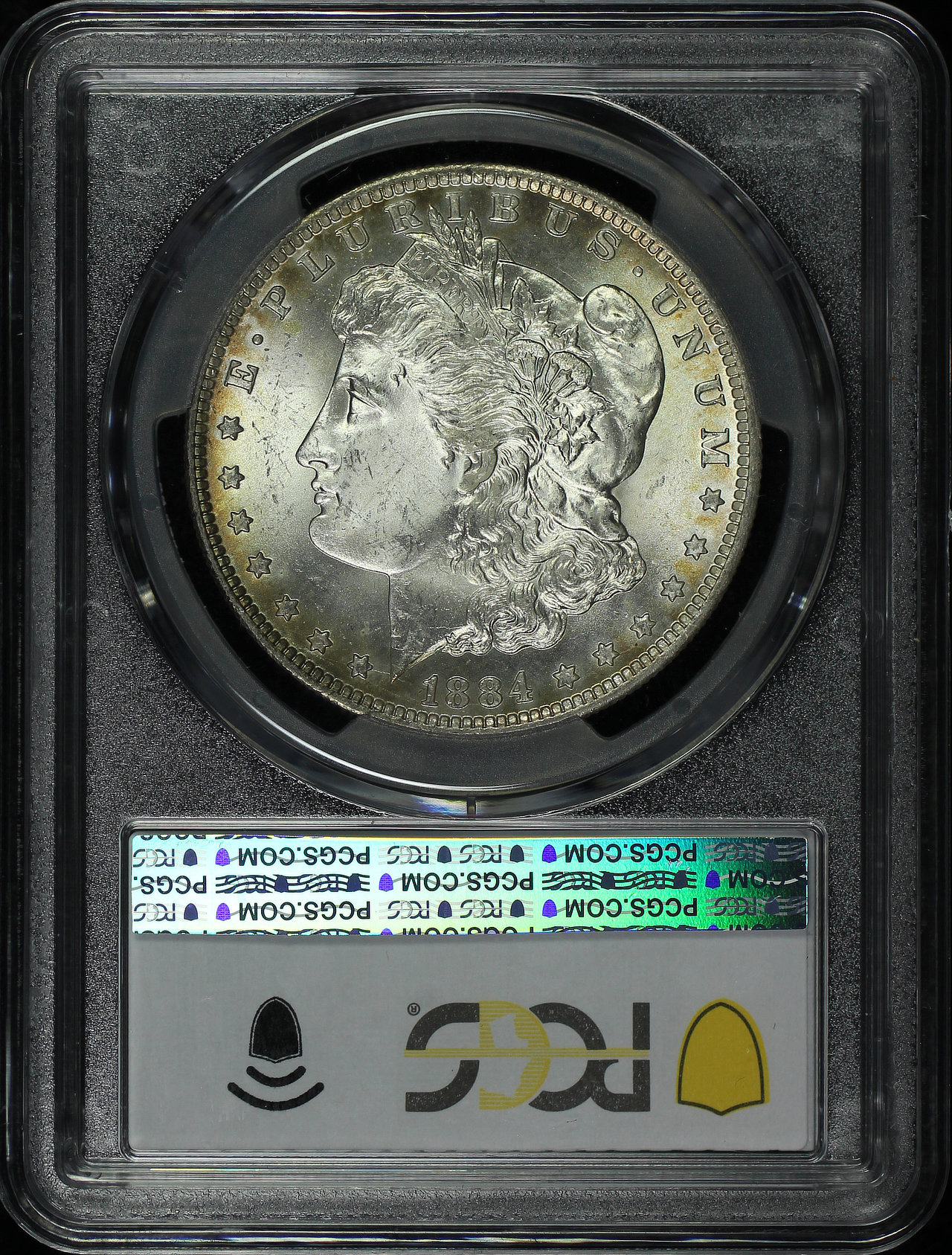 Reverse of this 1884-O Morgan Dollar PCGS MS-65 Rainbow Reverse Crescent Toning