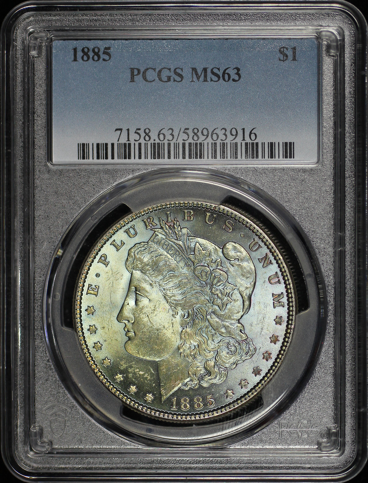 Obverse of this 1885 Morgan Dollar PCGS MS-63 Cyan & Amber Toning