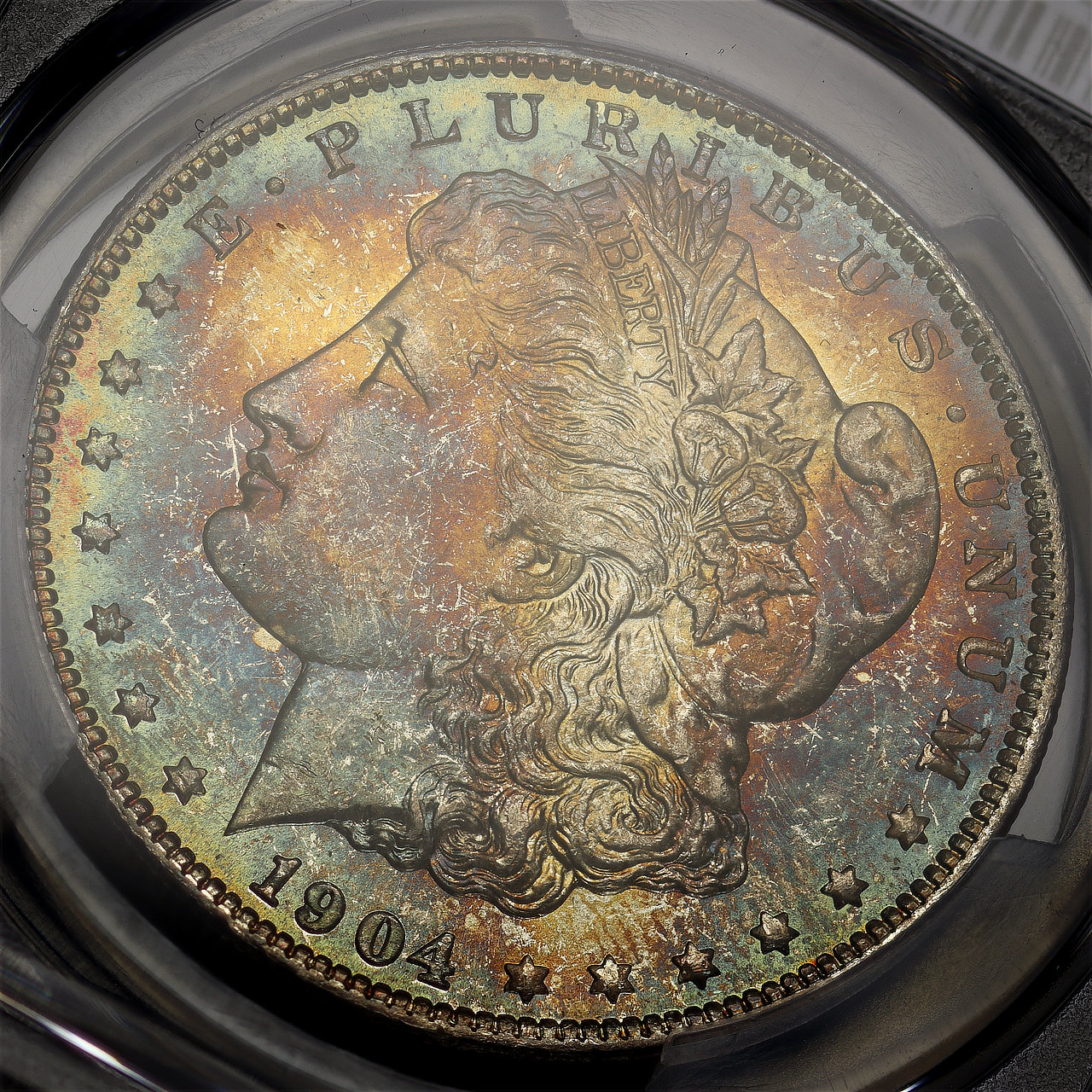 Gallery image of this 1904-O Morgan Dollar PCGS MS-63 Blue & Sunset Hue Toning