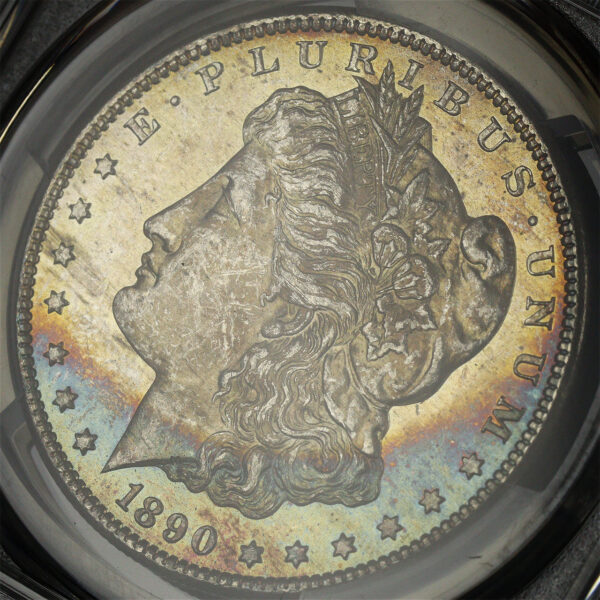 Gallery image of this 1890-CC Morgan Dollar Tailbar PCGS MS-63 CAC Blue & Sunset Hue Obverse Crescent Toning