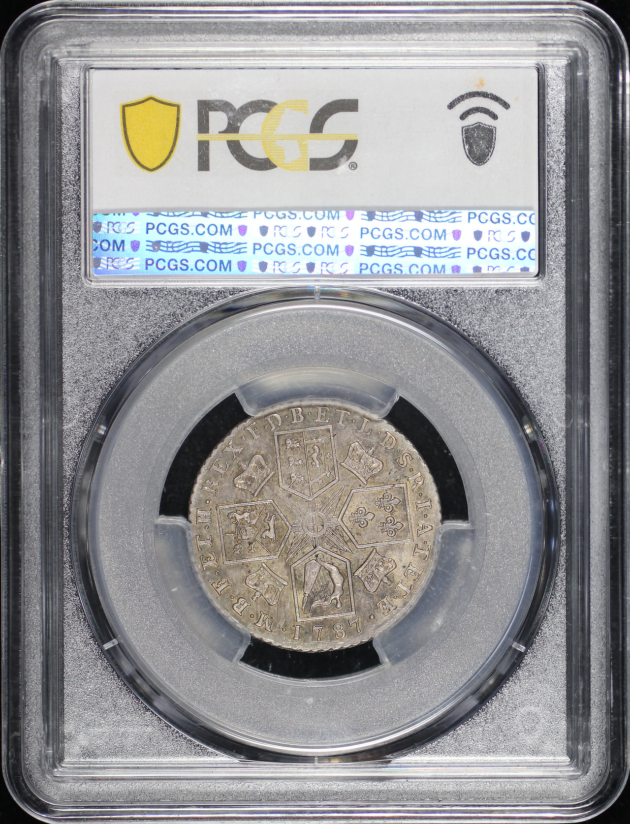 Reverse of this 1787 Great Britain King George III Silver 1 Shilling S-3743 w/o Hearts KM-607 PCGS AU-55