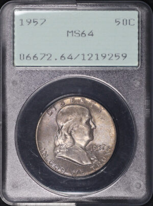 Obverse of this 1957 Franklin Half Dollar PCGS MS-64 Old Green Rattle Holder, Violet & Crimson Hue Toning