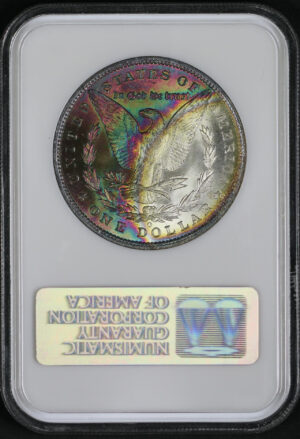Obverse of this 1885-O Morgan Dollar NGC MS-65 Old Fatty Holder with Rainbow Toning