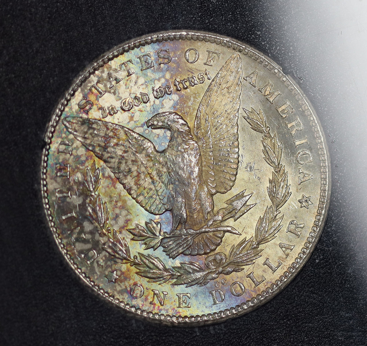 Gallery image of this 1879-CC Morgan Dollar NGC MS-63 CAC GSA Hard Pack With Box Reverse Rainbow Toning