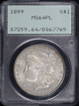 Obverse of this 1899 Morgan Dollar PCGS MS-64 PL Old Green Rattle Holder – Smoky Amber Toning