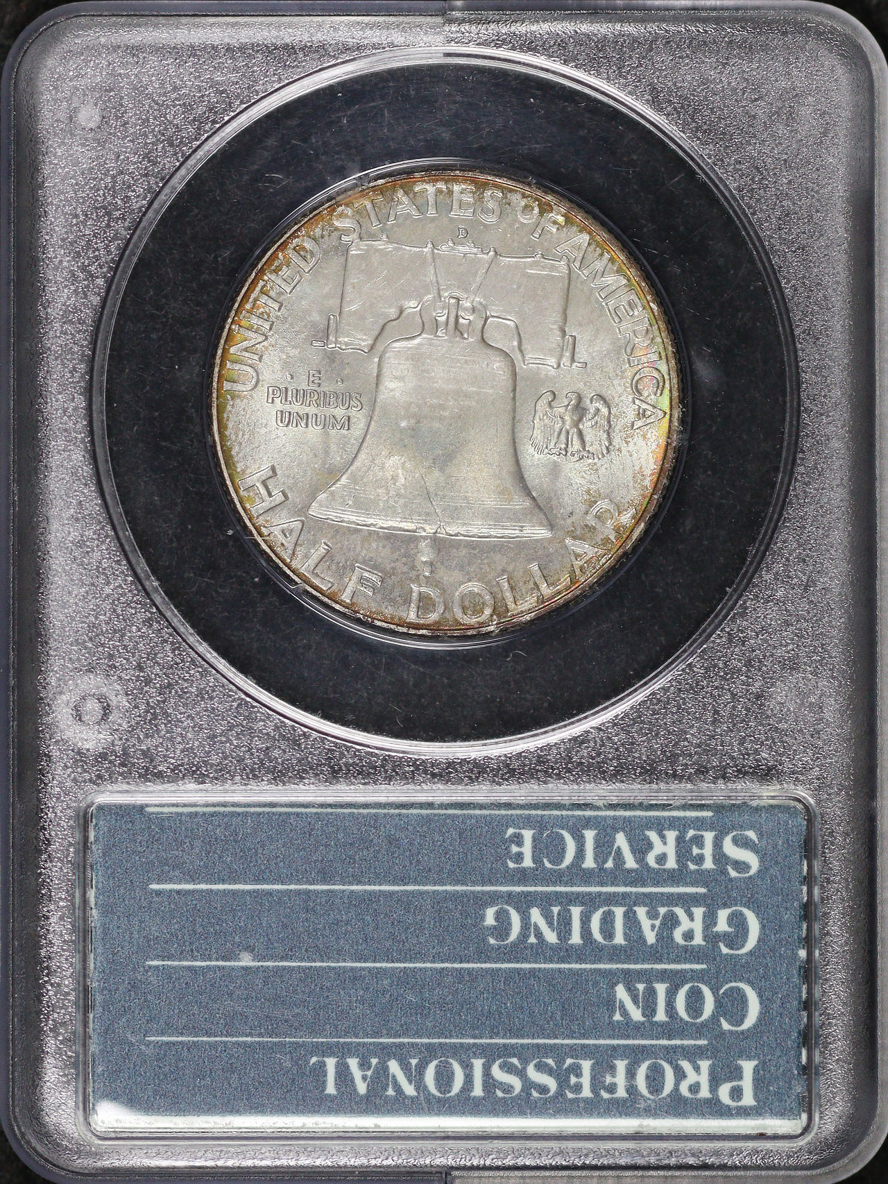 Reverse of this 1957-D Franklin Half Dollar PCGS MS-66 CAC Old Green Rattler Holder