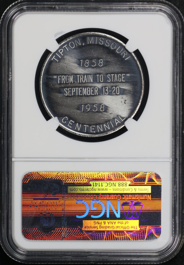 Reverse of this 1958 MO HK-513  Butterfield Overland So-Called Dollar NGC MS-64