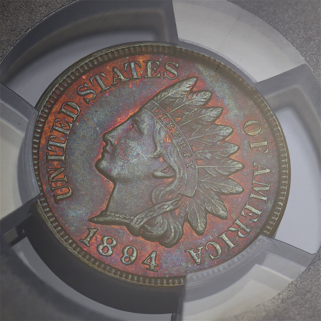 Gallery image of this 1894 Indian Cent PCGS MS-66 BN Fiery Sunset Hue Toning
