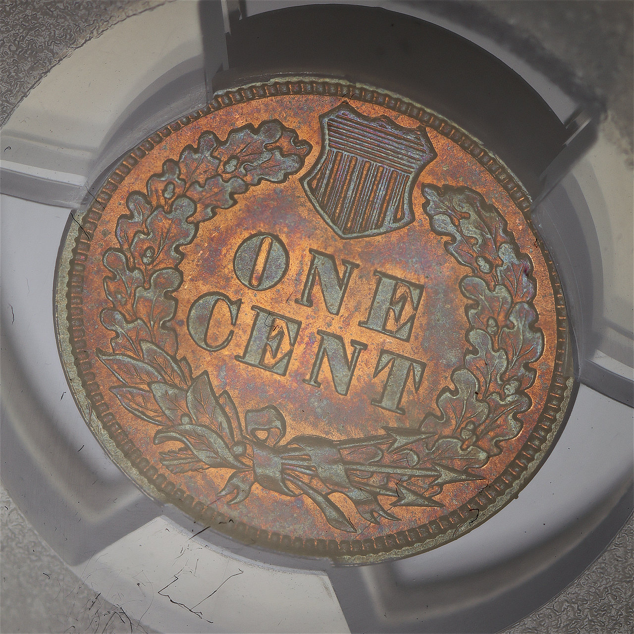 Gallery image of this 1894 Indian Cent PCGS MS-66 BN Fiery Sunset Hue Toning